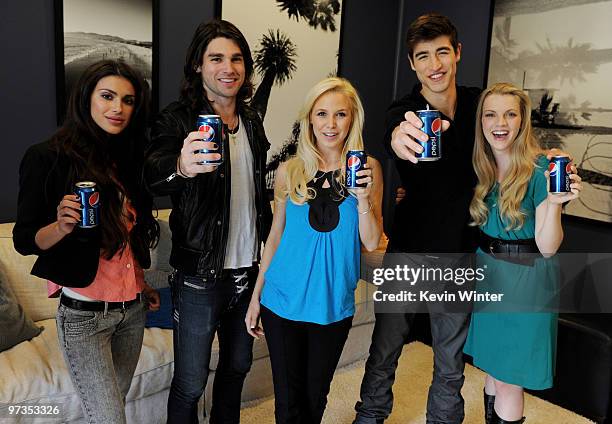 Model Giglianne Braga, musician Justin Gaston, actors Amanda Phillips, Benjamin Elliott and Kara Killmer pose at the "If I Can Dream" house tour and...