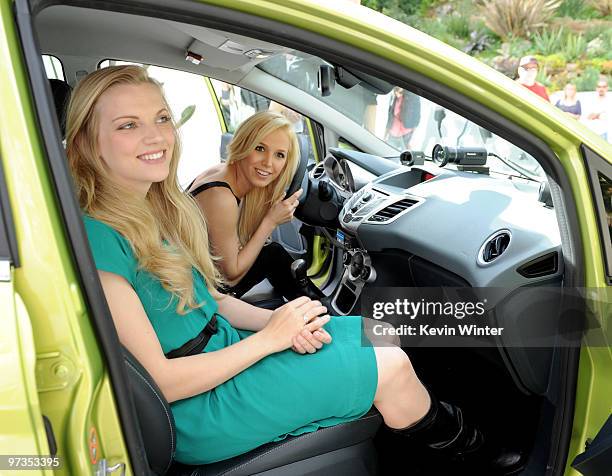 Actors Kara Killmer and Amanda Phillips pose at the "If I Can Dream" house tour and cast meet and greet at a private home in the Hollywood Hills on...