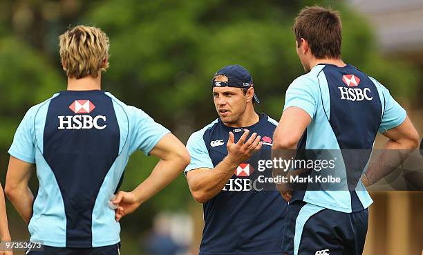 Phil Waugh speaks to his team mates during a Waratahs Super 14 training session at Victoria Barracks on March 2, 2010 in Sydney, Australia.