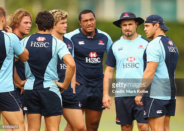 Phil Waugh speaks to his team mates during a Waratahs Super 14 training session at Victoria Barracks on March 2, 2010 in Sydney, Australia.