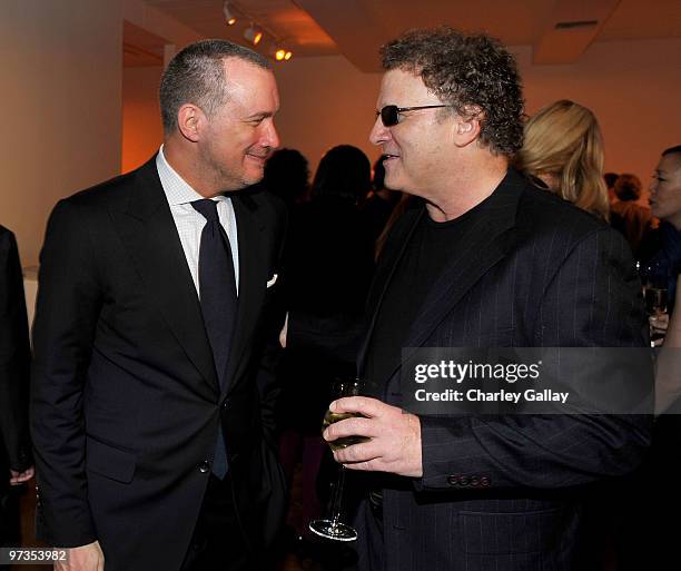 Publisher of Vanity Fair Edward Menicheschi and actor Albert Brooks attend the Kimberly Brooks' "The Stylist Project" exhibition hosted by Vanity...