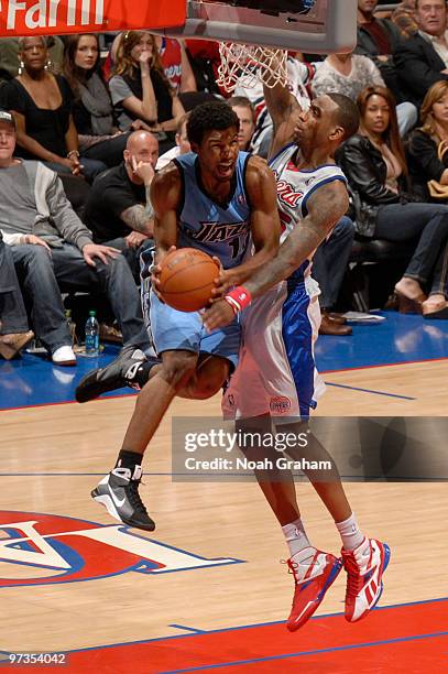 Ronnie Price of the Utah Jazz has his shot challenged by Rasual Butler of the Los Angeles Clippers at Staples Center on March 1, 2010 in Los Angeles,...