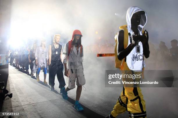 Models walk the runway at the MCM Fashion Show Spring/Summer 2019 during the 94th Pitti Immagine Uomo on June 13, 2018 in Florence, Italy.