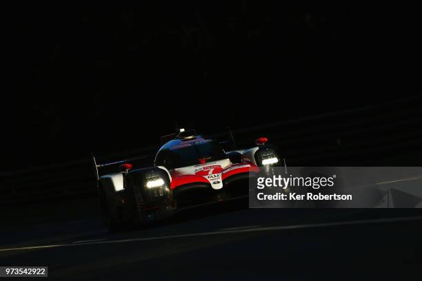 The Toyota Gazoo Racing TS050 Hybrid of Mike Conway, Kamui Kobayashi and Jose Maria Lopez drives during practice for the Le Mans 24 Hour race at the...