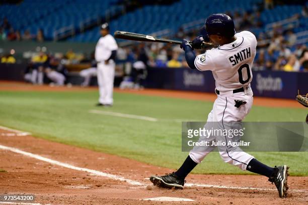 Mallex Smith of the Tampa Bay Rays hits a double in the ninth inning against the Toronto Blue Jays on June 13, 2018 at Tropicana Field in St...