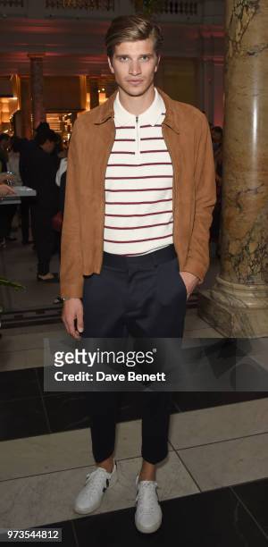 Toby-Huntington-Whiteley attends a private view of "Frida Kahlo: Making Her Self Up" at The V&A on June 13, 2018 in London, England.