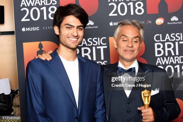 Matteo Bocelli and winner of the Classic BRITs Icon award, Andrea Bocelli pose in the winner room during the 2018 Classic BRIT Awards held at Royal...