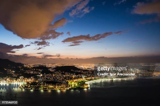 night at flamengo beach and rio de janeiro downtown, brazil - flamengo park stock pictures, royalty-free photos & images