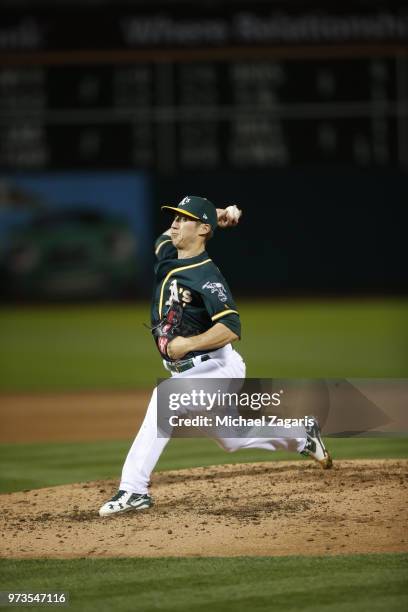 Daniel Gossett of the Oakland Athletics pitches during the game against the Seattle Mariners at the Oakland Alameda Coliseum on May 23, 2018 in...