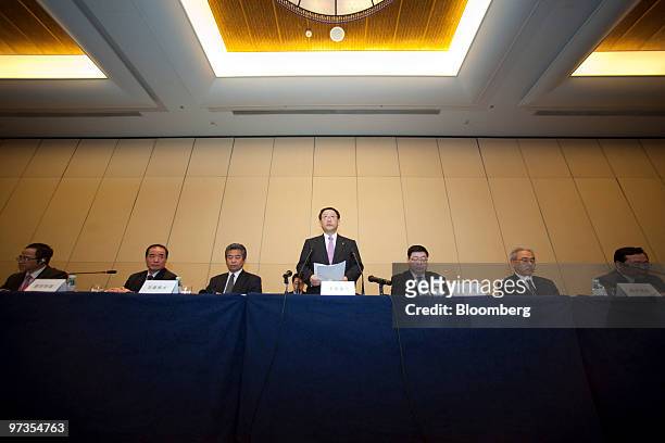 Akio Toyoda, president of Toyota Motor Corp., center, speaks during a news conference in Beijing, China, on Monday, March 1, 2010. Toyoda said the...