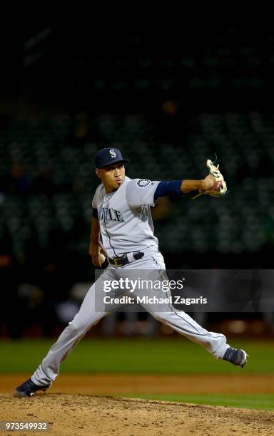 Edwin Diaz of the Seattle Mariners pitches during the game against the Oakland Athletics at the Oakland Alameda Coliseum on May 23, 2018 in Oakland,...