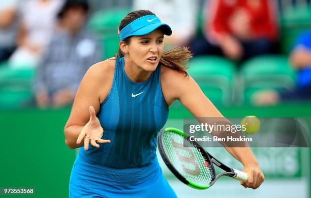 Laura Robson of Great Britain plays a backhand during her doubles match on Day Five of the Nature Valley Open at Nottingham Tennis Centre on June 13,...