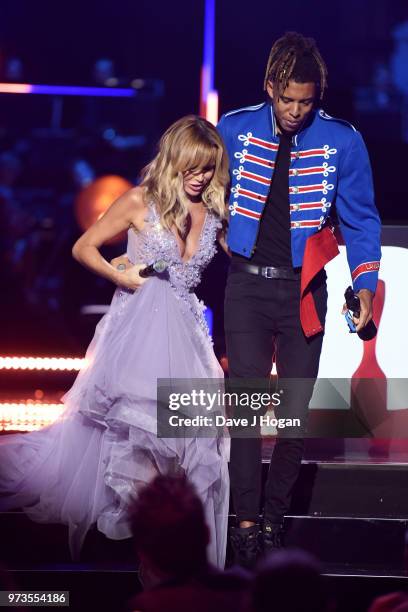 Amanda Holden and Tokio Myers on stage during the 2018 Classic BRIT Awards held at Royal Albert Hall on June 13, 2018 in London, England.