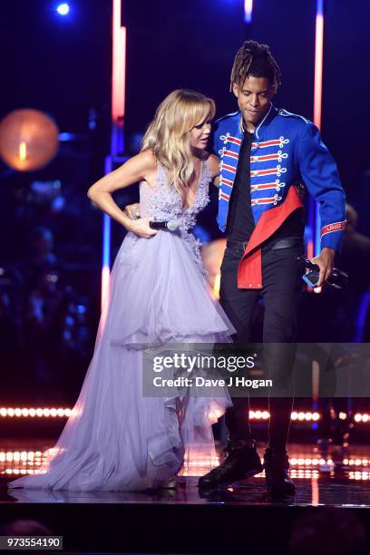 Amanda Holden and Tokio Myers on stage during the 2018 Classic BRIT Awards held at Royal Albert Hall on June 13, 2018 in London, England.