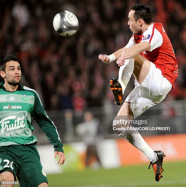 Valenciennes' Gael Danic vies with Saint-Etienne's Yohan Benalouane during their French L1 football match Valenciennes vs Saint-Etienne, on February...