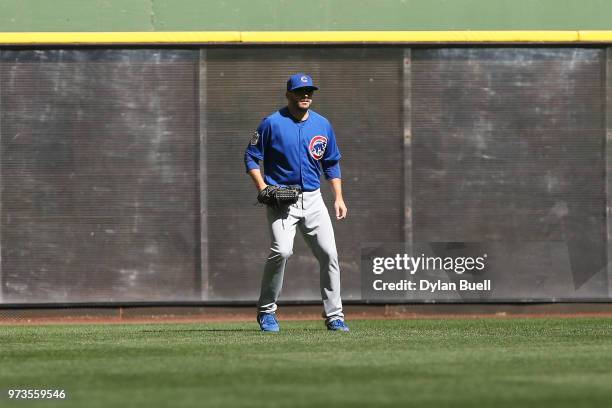 Brian Duensing of the Chicago Cubs plays left field in the eighth inning against the Milwaukee Brewers at Miller Park on May 27, 2018 in Milwaukee,...