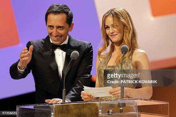 French actress and singer Vanessa Paradis and French humorist and master of the ceremony Gad Elmaleh prepare to annouce an award during the 35th...