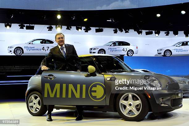 Chairman and CEO Norbert Reithofer presents an electric Mini car during the first press day at the 80th Geneva International Motor Show on March 2,...