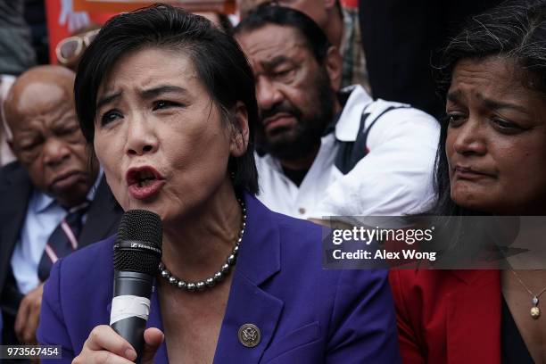 Rep. Judy Chu speaks as Rep. Pramila Jayapal , Rep. John Lewis and Rep. Al Green listen during a protest outside the headquarters of U.S. Customs and...