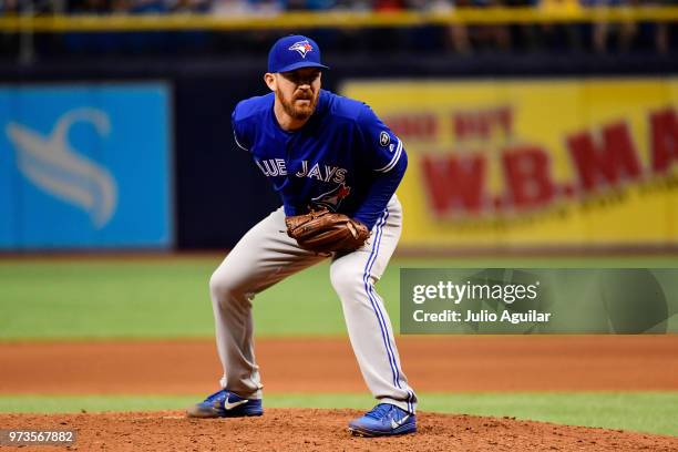 Danny Barnes of the Toronto Blue Jays looks to throw a pitch in the seventh inning against the Tampa Bay Rays on June 13, 2018 at Tropicana Field in...