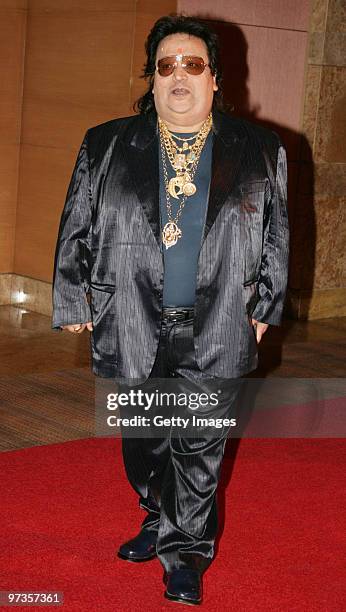 Bollywood music director Bappi Lahiri attends a party hosted by Indian businessman Anil Ambani and his actress wife Tina, February 28, 2010 in Mumbai.