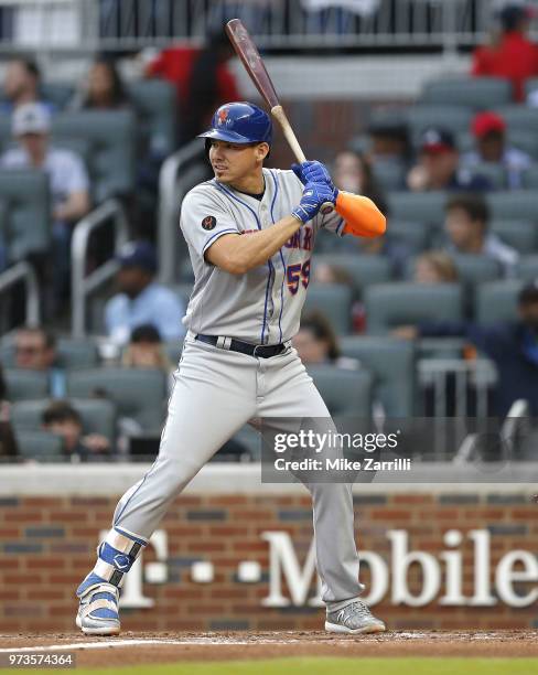 Catcher Jose Lobaton of the New York Mets waits in the batter's box for a pitch during the game against the Atlanta Braves at SunTrust Park on April...