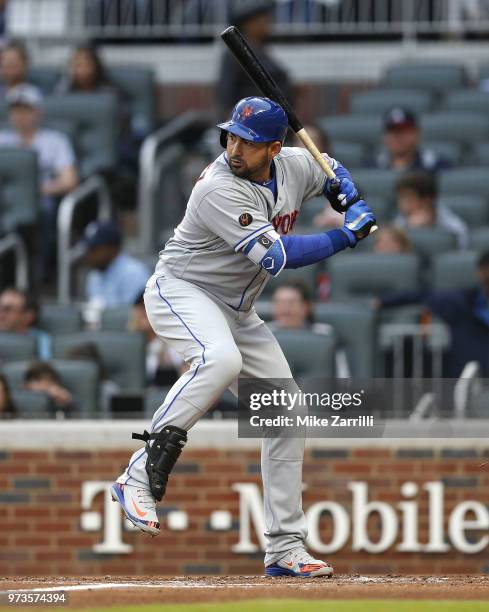 First baseman Adrian Gonzalez of the New York Mets waits in the batter's box for a pitch during the game against the Atlanta Braves at SunTrust Park...