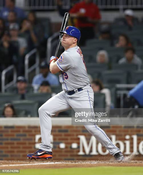 Right fielder Jay Bruce of the New York Mets swings during the game against the Atlanta Braves at SunTrust Park on April 21, 2018 in Atlanta, Georgia.