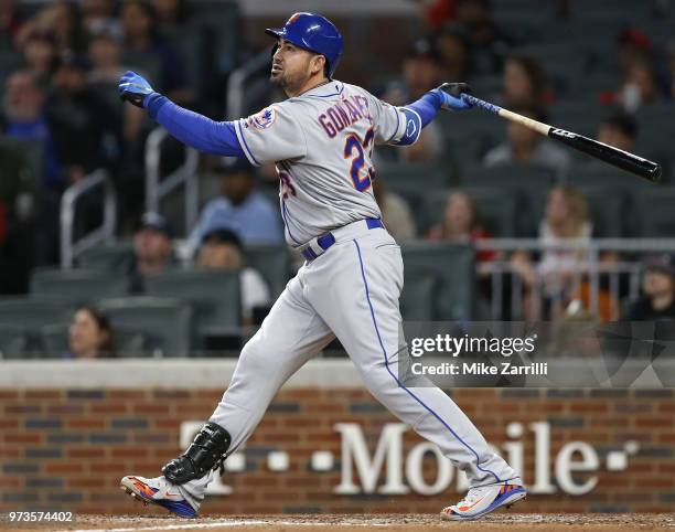 First baseman Adrian Gonzalez of the New York Mets swings during the game against the Atlanta Braves at SunTrust Park on April 21, 2018 in Atlanta,...