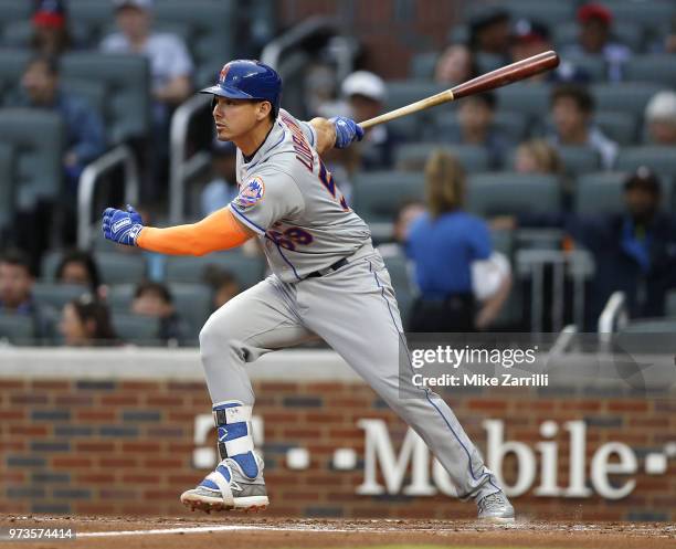 Catcher Jose Lobaton of the New York Mets swings during the game against the Atlanta Braves at SunTrust Park on April 21, 2018 in Atlanta, Georgia.