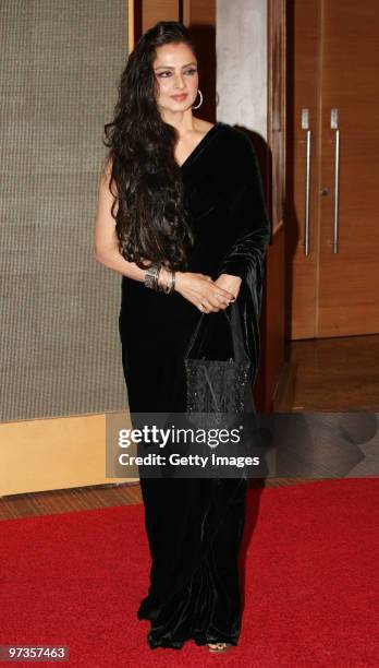 Bollywood actress Rekha attends a party hosted by Indian businessman Anil Ambani and his actress wife Tina, February 28, 2010 in Mumbai.