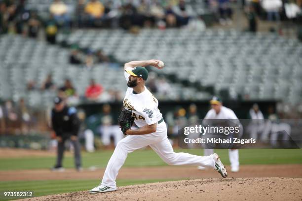 Chris Hatcher of the Oakland Athletics pitches during the game against the Seattle Mariners at the Oakland Alameda Coliseum on May 24, 2018 in...