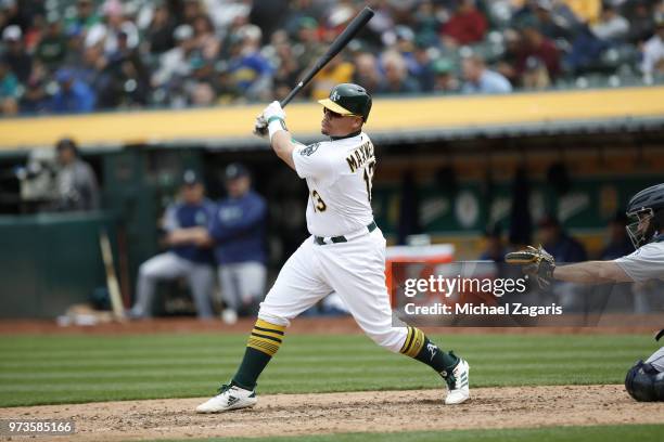 Bruce Maxwell of the Oakland Athletics bats during the game against the Seattle Mariners at the Oakland Alameda Coliseum on May 24, 2018 in Oakland,...