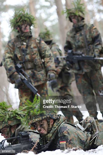 Bianca Schmidt smiles during a basic military service drill at the Clausewitz barrack on February 9, 2010 in Nienburg, Germany. German women's...