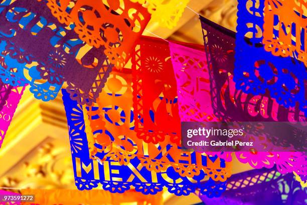 papel picado: the traditional folk art of mexico - papel picado stock pictures, royalty-free photos & images