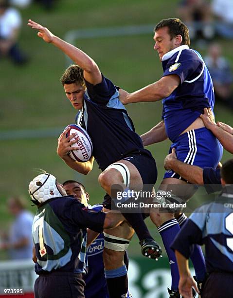 Jono West of the New South Wales Waratahs iin action in the line out against Glenn Taylor of the Auckland Blues during the Southern X Rugby Union...