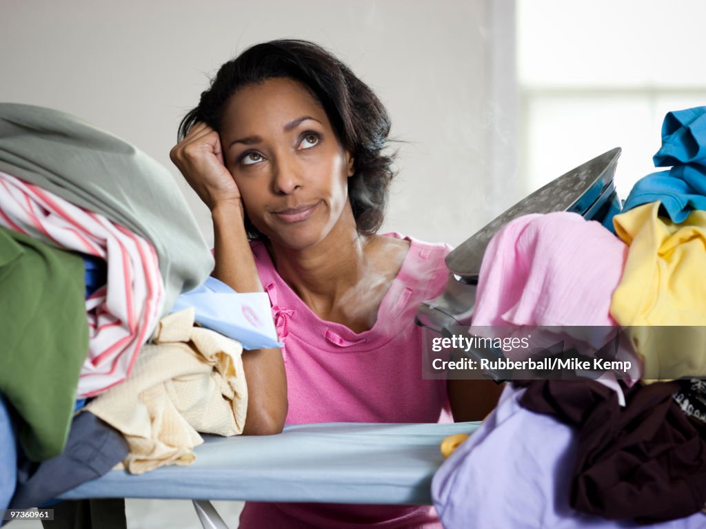 Orem, Utah, USA, mid adult woman ironing