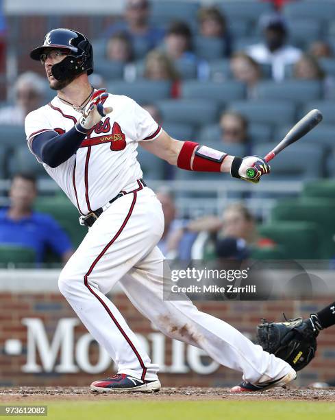 Catcher Tyler Flowers of the Atlanta Braves swings during the game against the Washington Nationals at SunTrust Park on June 2, 2018 in Atlanta,...