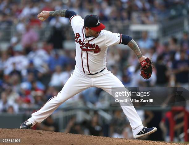 Pitcher Peter Moylan of the Atlanta Braves throws a pitch during the game against the Washington Nationals at SunTrust Park on June 2, 2018 in...