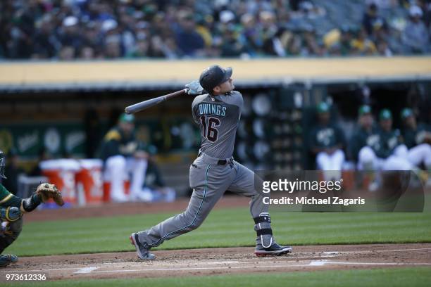 Chris Owings of the Arizona Diamondbacks bats during the game against the Oakland Athletics at the Oakland Alameda Coliseum on May 25, 2018 in...