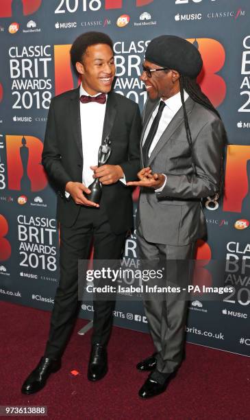 Nile Rodgers with Sheku Kanneh-Mason, after presenting him with his second award of the night, the Critics' Choice in Association with Apple Music...