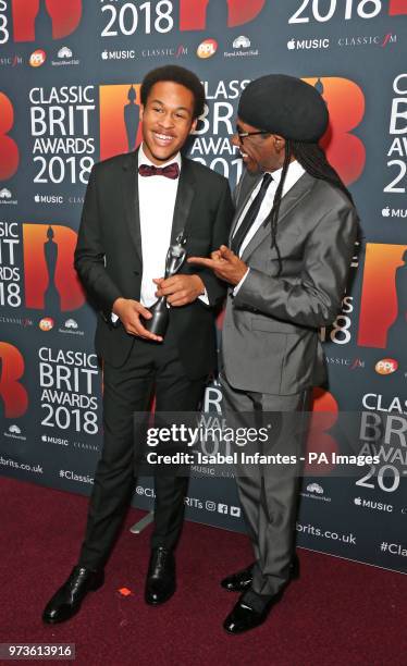 Nile Rodgers with Sheku Kanneh-Mason, after presenting him with his second award of the night, the Critics' Choice in Association with Apple Music...