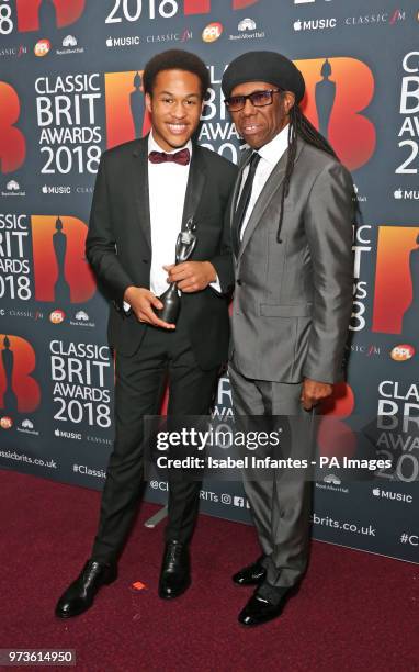 Nile Rodgers with Sheku Kanneh-Mason, after presenting him with his second award of the night, the Critics' Choice in Association with Apple Music...