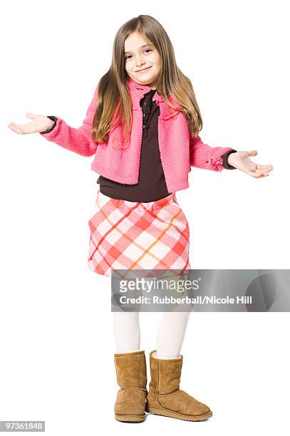 studio portrait of girl (8-9) with arms up - girls in plaid skirts stock pictures, royalty-free photos & images