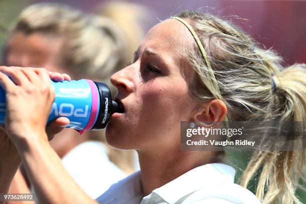 Kathrin Hendrich of Germany has a drink during warmup prior to the first half of an International Friendly match against Canada at Tim Hortons Field...