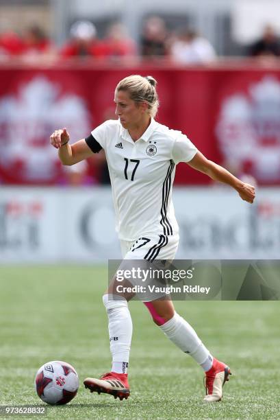 Verena Faibt of Germany dribbles the ball during the second half of an International Friendly match against Canada at Tim Hortons Field on June 10,...