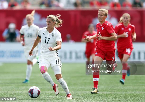 Verena Faibt of Germany dribbles the ball during the second half of an International Friendly match against Canada at Tim Hortons Field on June 10,...