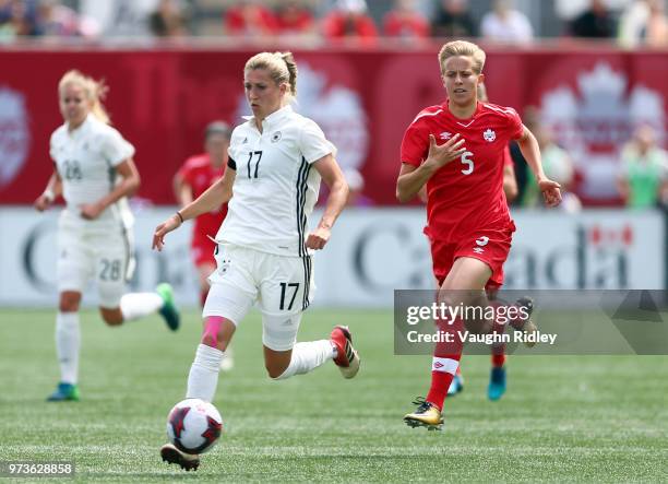 Verena Faibt of Germany dribbles the ball during the second half of an International Friendly match against Canada at Tim Hortons Field on June 10,...