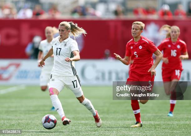 Verena Faibt of Germany dribbles the ball during the second half of an International Friendly match against Canada at Tim Hortons Field on June 10,...