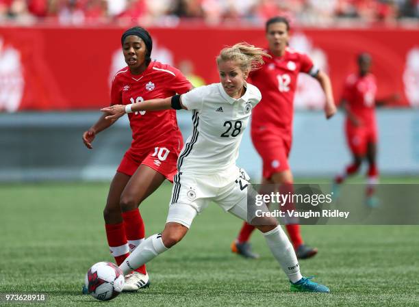 Lena Petermann of Germany dribbles the ball during the second half of an International Friendly match against Canada at Tim Hortons Field on June 10,...